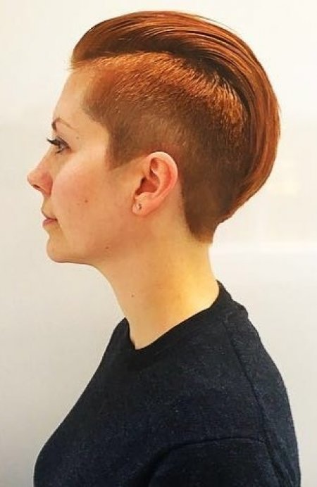 Womans haircut slickback with shaved sides by Mark at the klinik salon London 