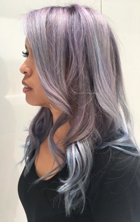 Hair being pre lightened and then coloured with pastel tones from grey, blue, purple and pink. done by Thea at the klinik hairdressing London.