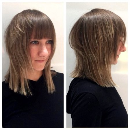 Hair cut by Mark at the klinik creating a mullet bob using overdirected round layers to add texture.