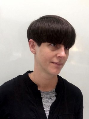 Thick dark hair has been cut into a bowl cut by Mark at the klinik hairdressing. He finished off by blowdrying it smooth with a denman brush and using Redken argain Oil to seal the finish! 