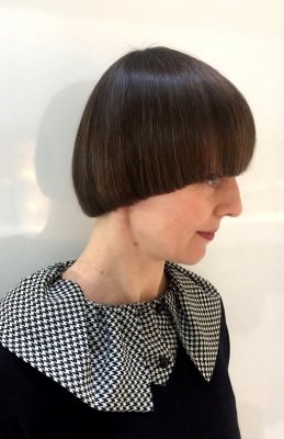 Hair being cut into a pageboy style by Mark at the klinik hairdressing in London. This shape is also known as a bowl cut.