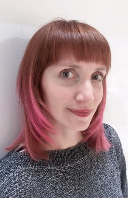 Hair being coloured a copper into a pink by L'Oreal and Manic Panic by Jenni at the klinik hairdressing in London EC1R 4QE