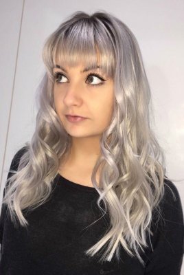 silvery blond hair is kept still in a good tone and shine by using the correct after care products to maintain its tone at the klinik hairdressing London.
