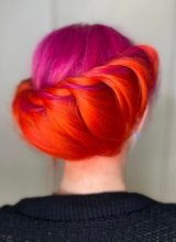 hair twisted in pink and orange colours at the klinik salon London